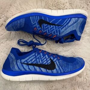 Nike Royal Blue Flyknit Running Sneakers with Black Swoosh